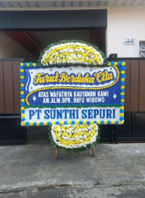 Papan Bunga Duka di Tayando Yamru