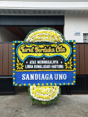 Papan Bunga Duka di Tayando Yamru